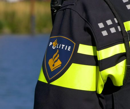 Politie logo met water