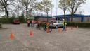 Leerlingen staan klaar om hun fietsexamen te starten