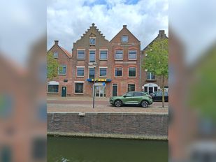 Verloederde panden Zevenbergen doorn in het oog