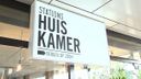 Luxer op de trein wachten in StationsHuiskamer Bergen op Zoom