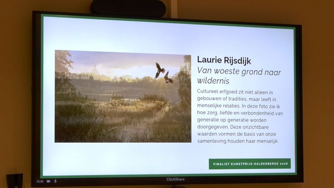 Een foto van het werk van Laurie op het digitale bord.