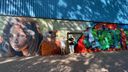 Graffitikunstenaars knappen muren van sporthal Kannebuis in Halsteren op