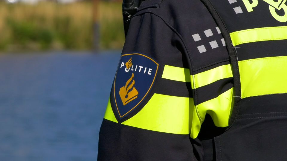 Politie logo met water