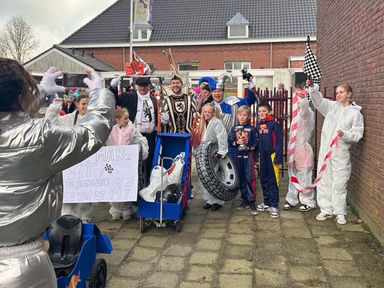 Op de foto met het drietal.