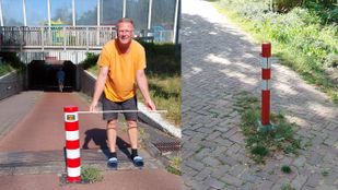 Ron Vuijk van de fietsersbond bij een van de paaltjes in Roosendaal.